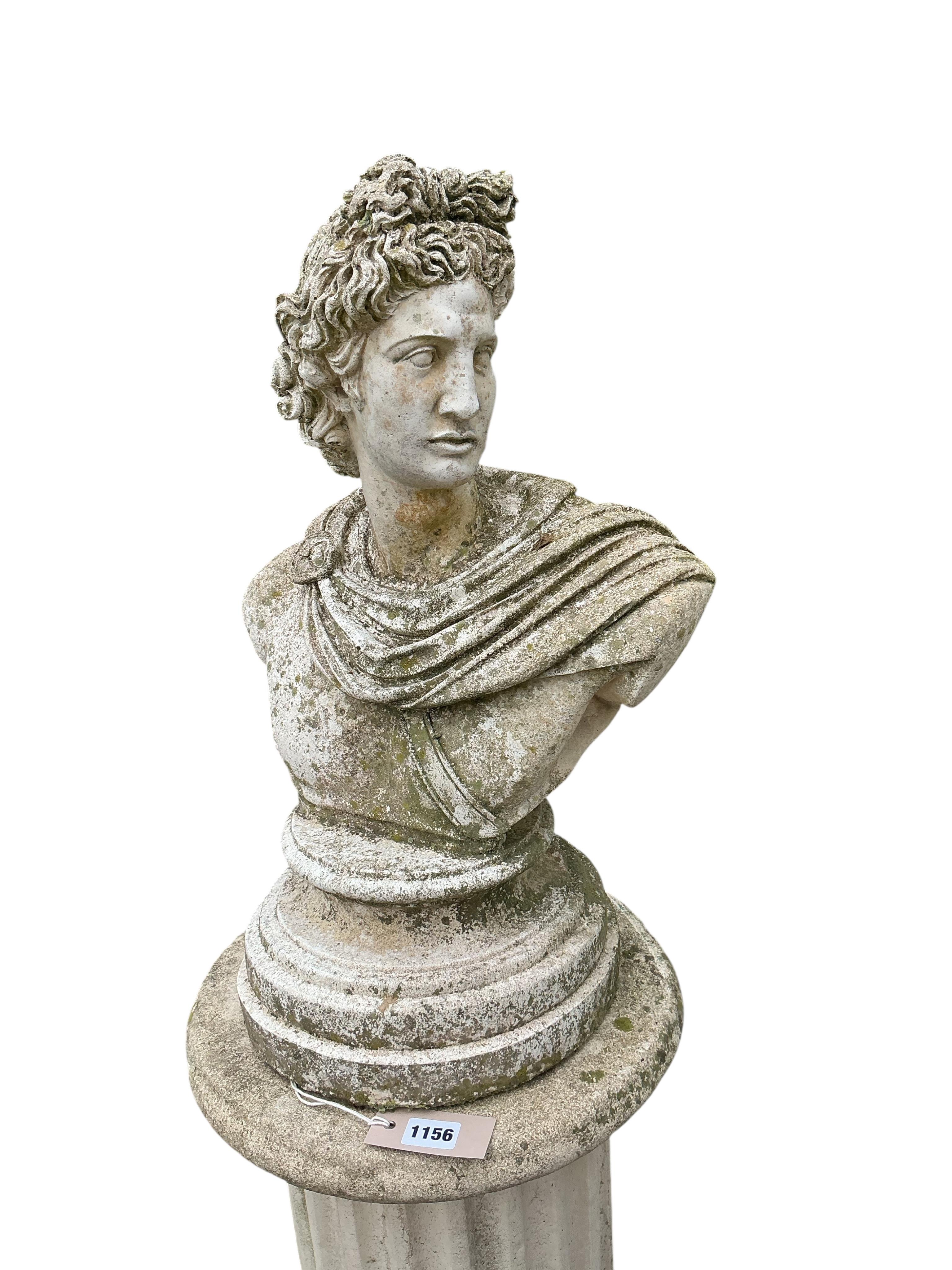 A reconstituted stone Roman style bust on fluted pillar, height 130cm
